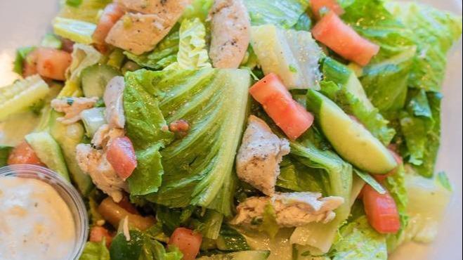 Lemon Garlic Chicken Salad · Romaine heart, chicken, tomatoes, cucumbers, and green onions, tossed with fresh squeezed lemon juice, extra virgin olive oil, and a touch of garlic.