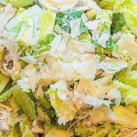 Chicken Caesar Salad · Romaine lettuce, pita croutons, and shredded chicken breast, tossed with Maison Caesar dress...