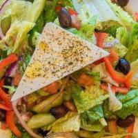 Greek Salad · A vegetarian mix of romaine heart, tomatoes, cucumbers, red onions, and red bell peppers, to...