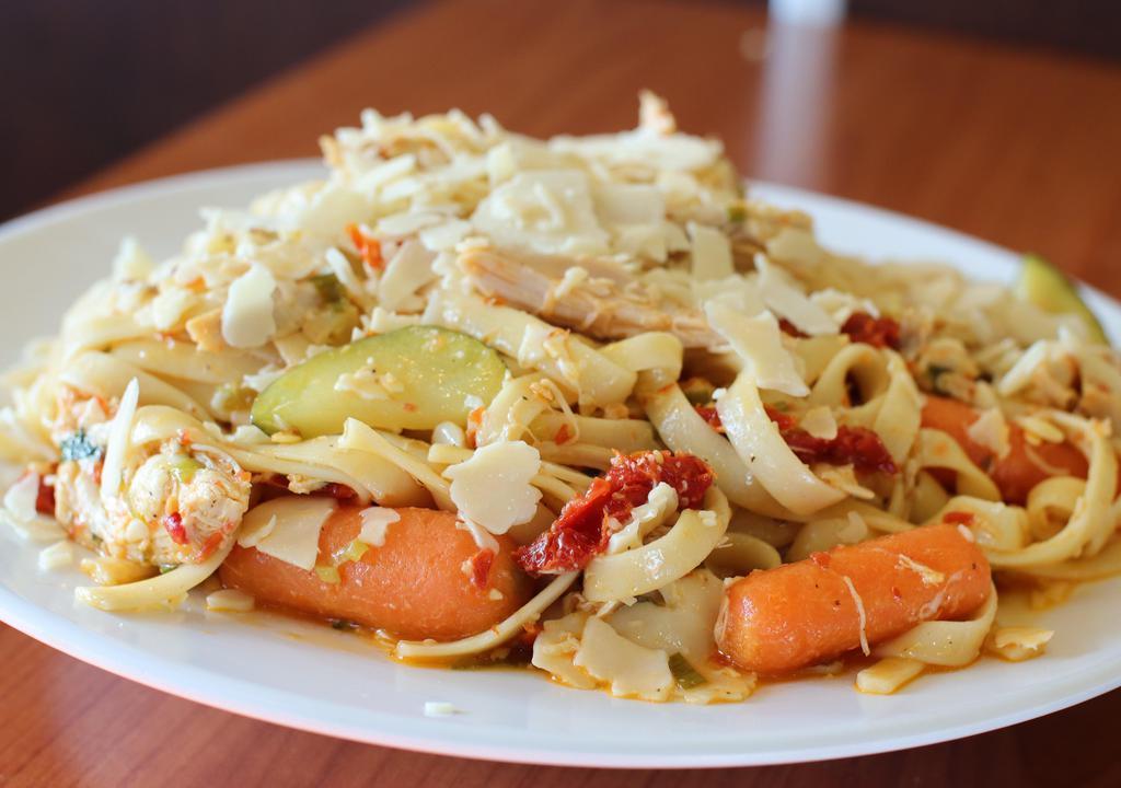 Spicy Fettuccine · Spicy Lemon Garlic Chicken, carrots, zucchini, onions, cilantro, garlic, olive oil, lemon, sundried tomatoes topped with fresh Parmesan cheese.