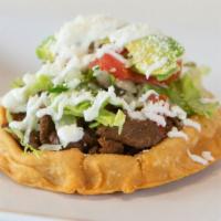 Sope · Handmade sope with beans  your choice of meat and lettuce, tomatoes, sour cream, and avocado.