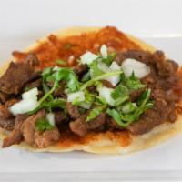 Quesataco · mozzarella cheese infused into a corn tortilla  paired with your choice of meat.