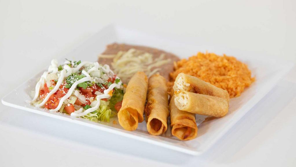 Flautas (4) Rice & Beans · Shredded beef, chicken or cheese. 4 flautas topped with lettuce, tomatoes, sour cream & avocado with rice & beans.