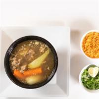 Caldo De Res · Beef Stew
chunks of beef, carrots, potatoes with a side of rice.