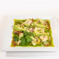 Aguachiles · Shrimp with chili peppers, lime juice, salt, cilantro, slices of cucumber and slices of onion.