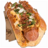 Dirty Chili Dog · 100% All Beef Dog Wrapped in Center Cut Bacon |

In The Bun: Chipotle Aioli Spread |

On The...