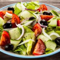Greek Salad · Vegan. Gluten-free. Romaine lettuce, tomatoes, cucumber, onion, feta, olives.