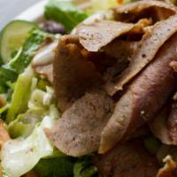 Beef & Lamb Gyro Salad · Gyro meat, Greek salad, pita, tzatziki sauce.