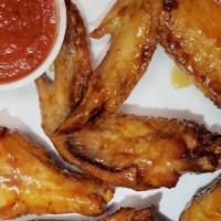 Honey Chicken Wings (6 Pc) · Honey glazed Chicken Wings, get your hands ready, it may get messy and tasty!