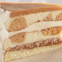Salted Caramel Vanilla Crunch Cake · Light, buttery vanilla-flecked cake has waves of caramel cake and layered with salted carame...