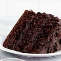 6 Layer Chocolate Cake · Colossal layer upon layer of dark moist chocolate cake, sandwiched with our silkiest smooth ...
