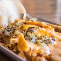 Beastly Style Fries · Seasoned Fries smothered in 1000 Island, Grilled, Onions, Melted Cheese