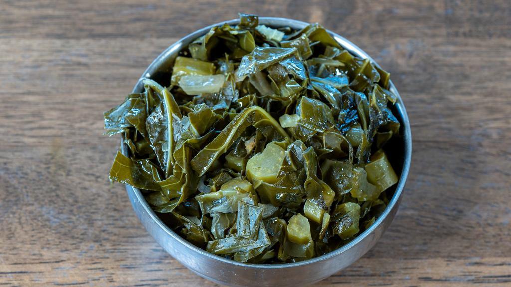 Collard Greens · Uncle Jack was famous for his spicy collard greens. We took out the pork but left the spice in this humble farm fresh organic dish.