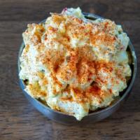 Creole Potato Salad · Fresh diced russet potatoes cooked to a smooth texture. We then add fresh celery, red pepper...