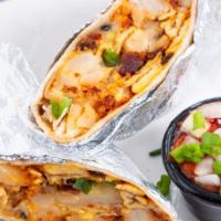 Breakfast Burrito · Includes home fries, eggs, choice of meat, mild salsa, and cheese. (choices: bacon, sausage,...