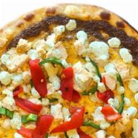 Spicy Chipotle Chicken Pizza · Chicken, Poblanos, Roasted Red Pepper, Colby Cheese, Cilantro Sauce, and Chipotle Pesto on a...