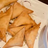 Crab Rangoon (8) · Crispy fried wonton with crabmeat, cream cheese and scallion. Served with sweet and sour sau...