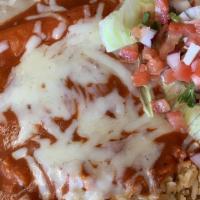 Enchilada · (pollo, asada, deshebrada, queso) / Chicken, beef, shredded or cheese
