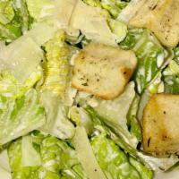 Caesar Salad · Romaine lettuce, shaved Parmesan, house made croutons and Caesar dressing