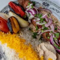 Beef Lula Kebab Combo · Ground beef kebab with pita bread, rice grilled vegetables and choice of two salads and beve...
