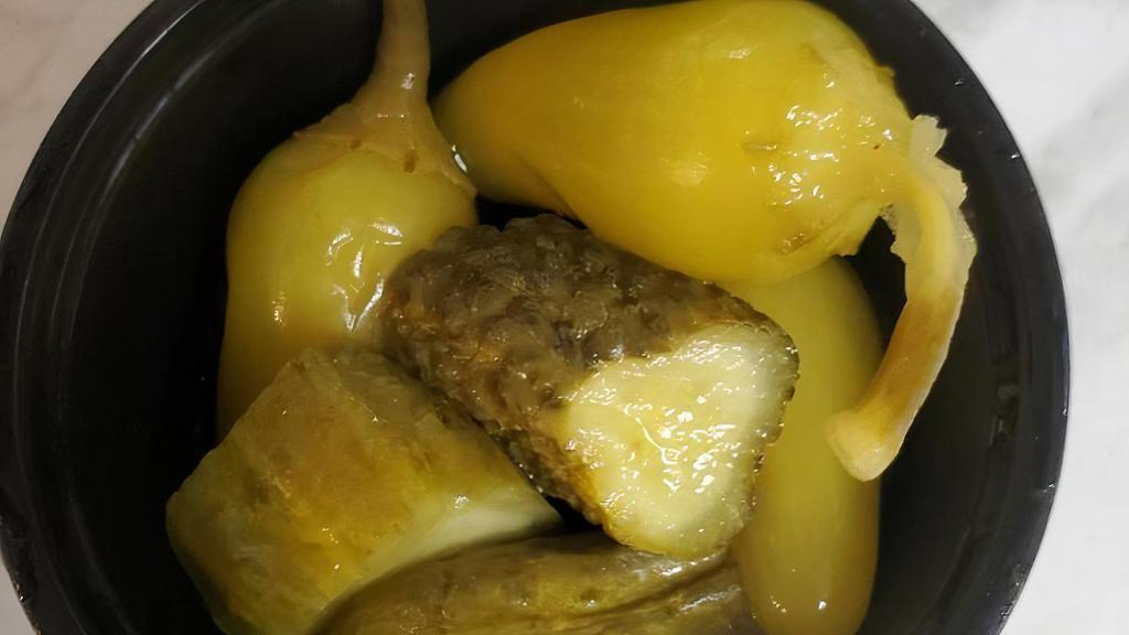Pickle Pepper Mix · Pickles and yellow peppers.