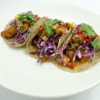 Fish Tacos · 3 tacos, beer battered or pan roasted fresh corn tortilla, shaved red cabbage, chipotle aiol...