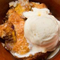 Aunt Sally'S Peach Cobbler · This peach cobbler is a show stopper. You never thought a fruit could taste so good! Whole p...
