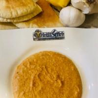 Roasted Garlic Hummus · Vegan, gluten-free. Chickpeas blended with roasted garlic, olive oil, lemon juice, and spice...