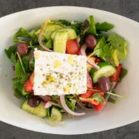 Mediterranean Salad · Tomato, cucumber, red onion, feta cheese, olives, fresh basil, arugula, lemon vinaigrette dr...
