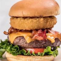 Original Legendary Burger · The burger that started it all! Steak burger, with applewood bacon, cheddar cheese, crispy o...