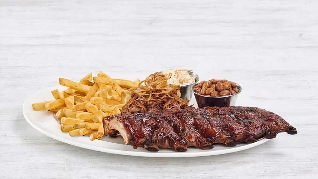 Smokehouse Bbq Combo · Slow-cooked baby back ribs and pulled pork served with our house-made bbq sauce, served with seasoned fries, coleslaw, and ranch-style beans.