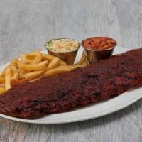 Baby Back Ribs · Seasoned with our signature spice blend, then glazed with our house-made barbecue sauce and ...
