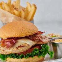Grilled Chicken Sandwich · 8 oz. grilled chicken with melted Monterey Jack cheese, applewood bacon, leaf lettuce and vi...