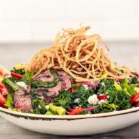 Steak Salad · 8 oz. grilled steak on a bed of fresh mixed greens tossed in a blue cheese vinaigrette, with...
