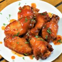 Thai Spicy Wings (6Pcs) · Deep fried party wings marinated with house  garlic sauce over night and deep fried with bat...