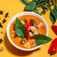 Red Curry · Red curry paste cooked with coconut milk, sliced bamboo shoots, Thai eggplant, red, green be...