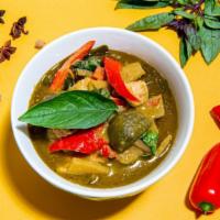 Green Curry · Fresh green chili paste cooked with coconut milk, Thai eggplant, red bell pepper, sliced bam...