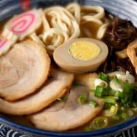 Japanese Style Noodle · Cha-shu pork served with bamboo shoot, dried seaweed, block mushrooms fish cake, egg, and gr...