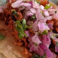 1 Veganchicken  Crispy Taco 1 Chicken Enchilada Combination · 1 taco 1 enchilada combination with rice and beans