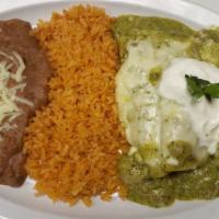 Enchiladas Suizas ( Sweiss) Chicken · filled with shredded of you're choice of  chicken, cheese or carnitas.  Covered with green s...