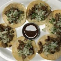Cantina Tacos · Popular items. 6 street tacos with Angus beef sirloin on corn tortillas with chopped onions ...