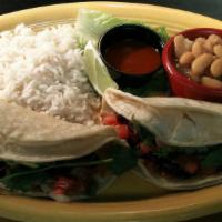 Fish Tacos · A premium fillet of pollock fish or shrimp that has been marinated with select wine Mexican ...