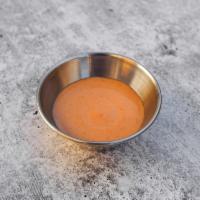 Side Of Sriracha Aioli · Mild-Medium spice level aioli with a splash of lime juice.