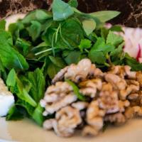 Sabzi & Gerdoo (V) · Fresh array of herbs and radish, walnuts, feta cheese served with freshly baked naan right o...