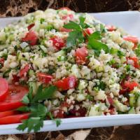 Tabouli Salad (V) · Simple Mediterranean salad, finely chopped parsley, tomato, onion mint bulgur wheat, and sea...