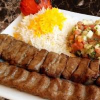 Kabab Soltani · Combination plate of barg and beef koobideh. One skewer of thinly sliced filet mignon and on...
