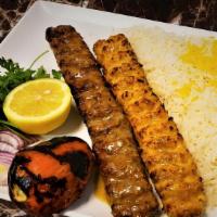 Combo Koobideh Kabab · Grilled ground beef and chicken, grilled tomato and Anaheim pepper. served with saffron basm...