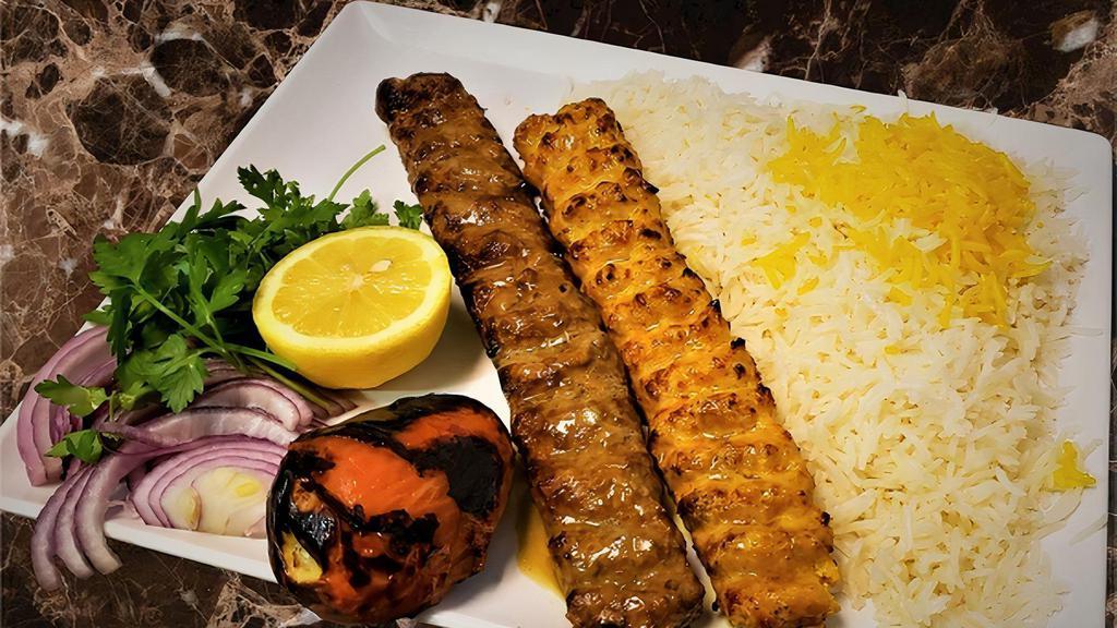 Combo Koobideh Kabab · Grilled ground beef and chicken, grilled tomato and Anaheim pepper. served with saffron basmati rice. One skewer of each.