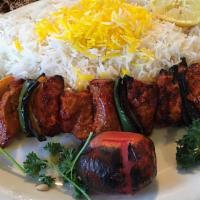 Shish Kabab · Succulent chunks of filet mignon marinated and grilled with tomato and Anaheim pepper. serve...