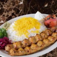 Chicken Koobideh · Two skewers of grilled ground chicken served with basmati rice with saffron, grilled tomato ...